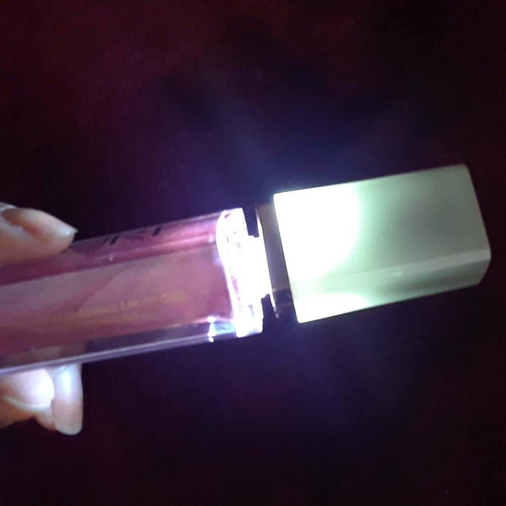Brand new never used Pure Ilumination lip gloss